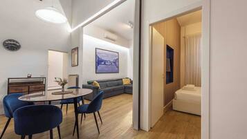 Comfort Apartment | Living area | 40-inch flat-screen TV with digital channels, TV