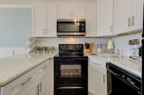 Condo, 1 Bedroom | Private kitchen | Fridge, oven, coffee/tea maker, toaster