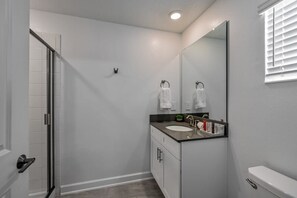 Bathtub, hair dryer, towels