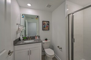 Bathtub, hair dryer, towels