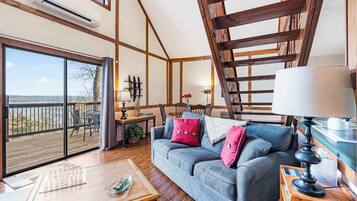 Cabin, 1 King Bed with Sofa bed, Balcony (Skipjack Cottage Branson) | Living area | 41-inch flat-screen TV with digital channels, fireplace