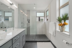 Shower, hair dryer, towels, soap