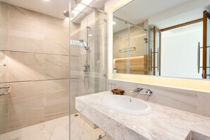 Shower, hair dryer, towels, soap