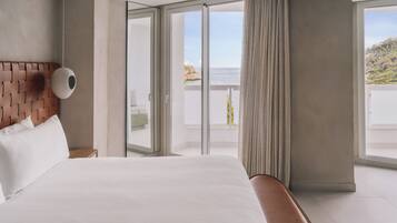 Suite, 1 King Bed, Sea View | Minibar, in-room safe, laptop workspace, blackout drapes