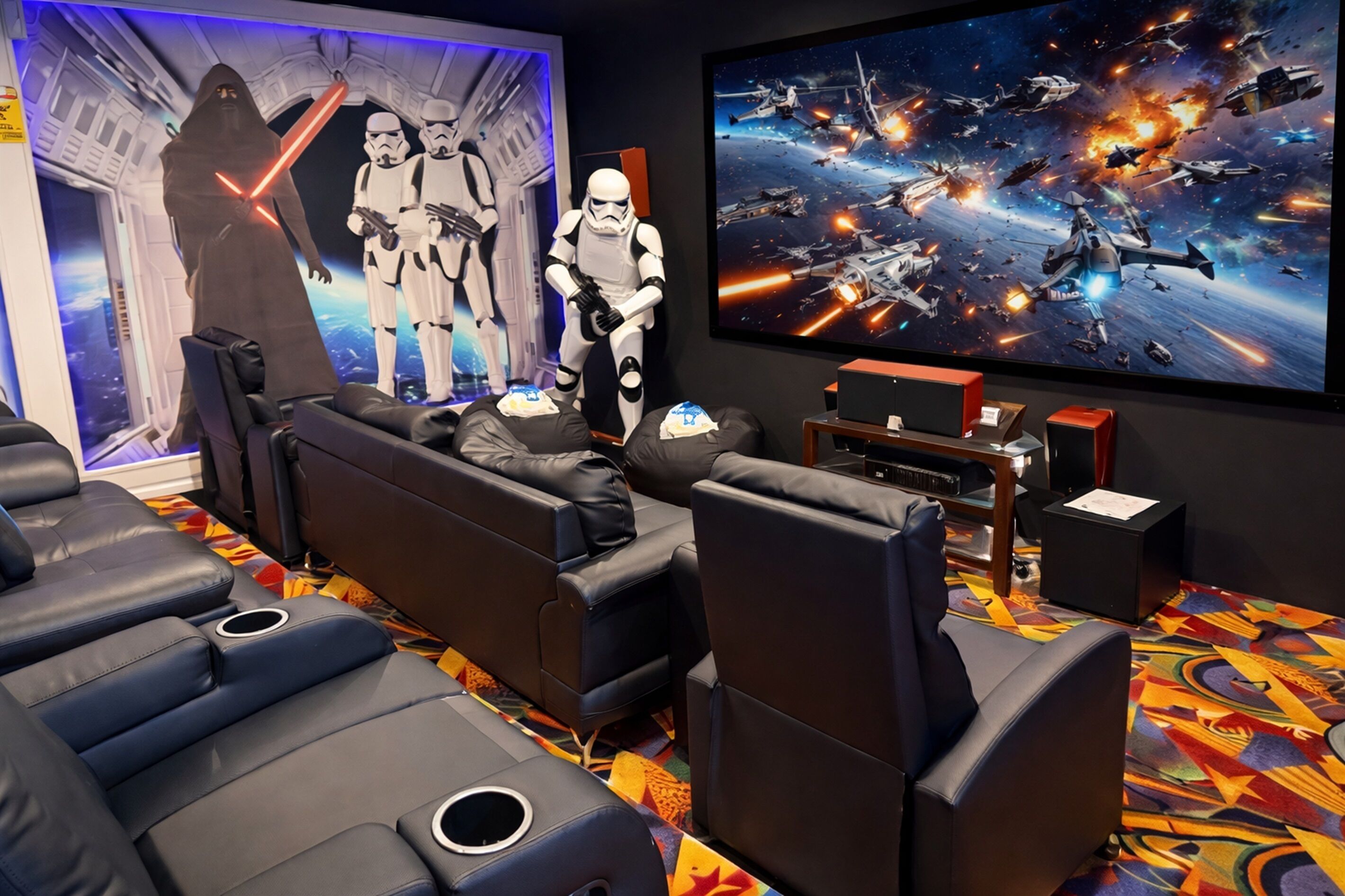 Cine con butacas de cuero negro, una pantalla grande y decoración temática de Star Wars.