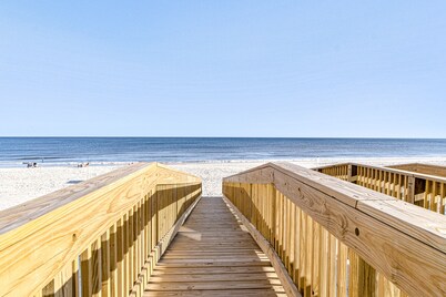 Spacious beachside community home with ocean view, private pool, & fireplace