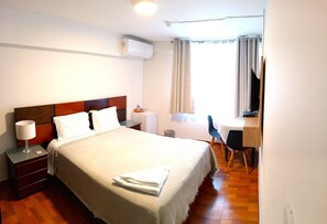 Premium bedding, down comforters, pillowtop beds, minibar