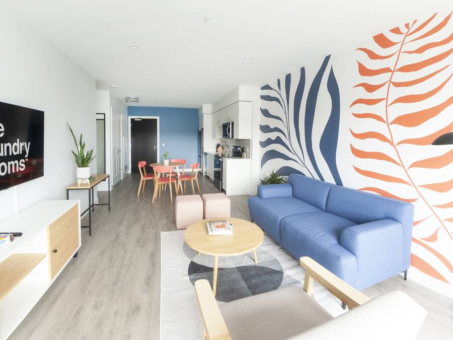 Business Apartment | Living area | 55-inch Smart TV with digital channels, TV