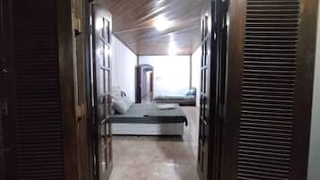 Family Quadruple Room, 1 Bedroom, Private Bathroom | Down comforters, iron/ironing board, free WiFi, bed sheets
