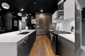 Private kitchen - KAI Aayan Modern 4 story home w/ downtown views (Dallas)