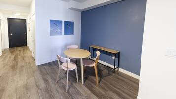 Business Apartment | Living area | 55-inch Smart TV with digital channels, TV, streaming services