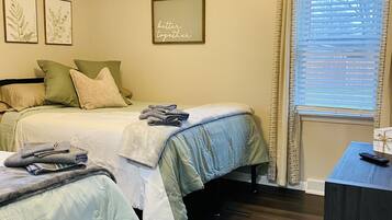 2 dormitorios, tabla de planchar con plancha, wifi gratis y ropa de cama
