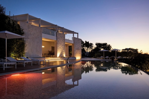 Seasonal outdoor pool, open 7:00 AM to 8:30 PM, pool umbrellas