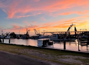 Boats docked at the marina, offering a serene waterfront setting.