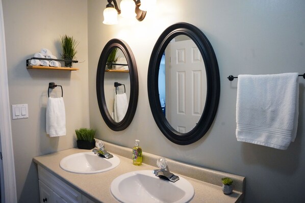 Hair dryer, towels, soap, shampoo