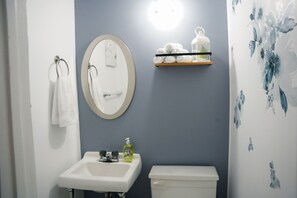 Hair dryer, towels, soap, shampoo