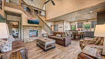 Smart-tv, eldstad, tv-spel och bordsfotboll