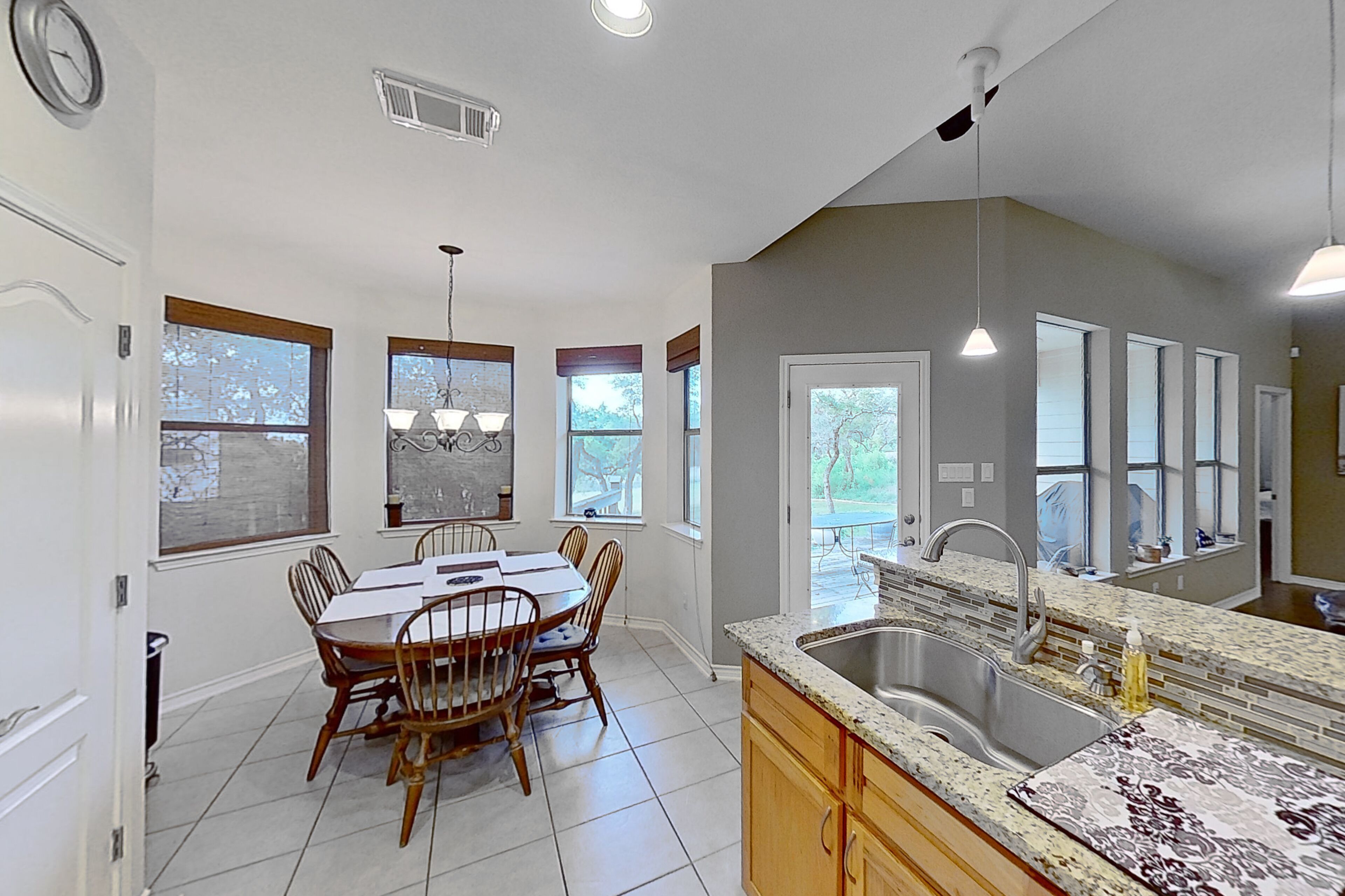 Scenic retreat with fenced yard, patio, central AC, & washer/dryer