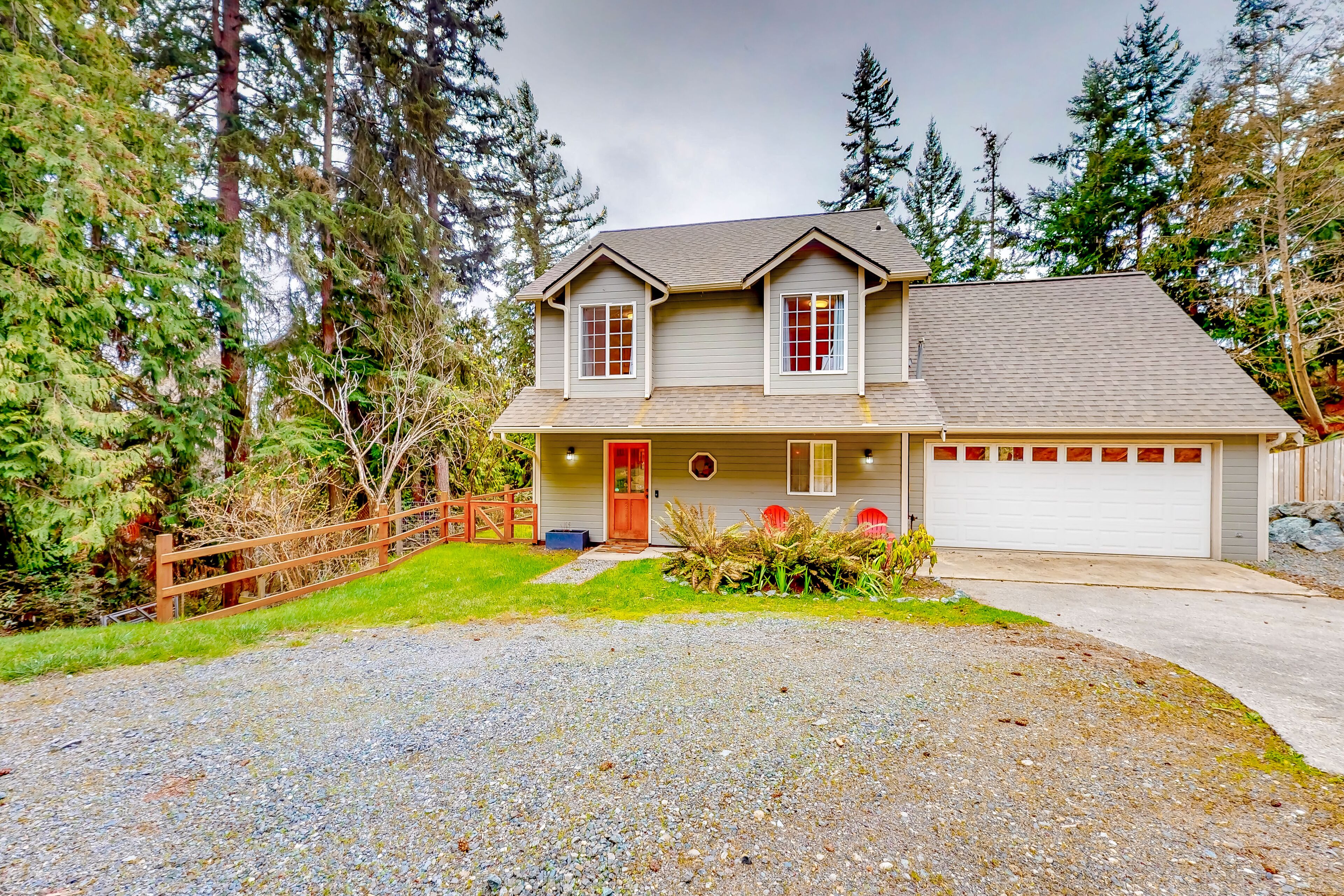 Peaceful, tree-lined home near Clinton with large yard, fireplace & Peloton