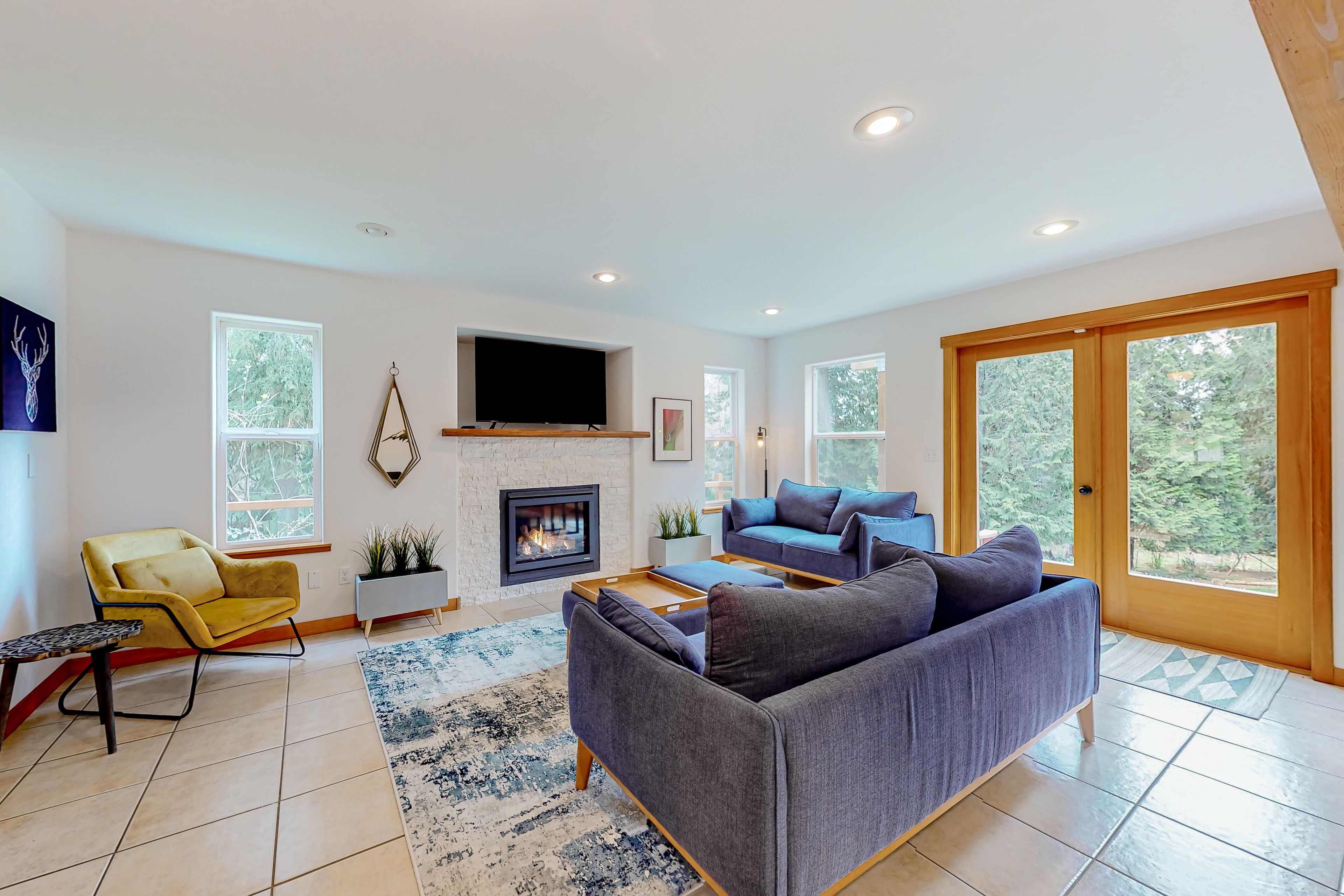 Peaceful, tree-lined home near Clinton with large yard, fireplace & Peloton