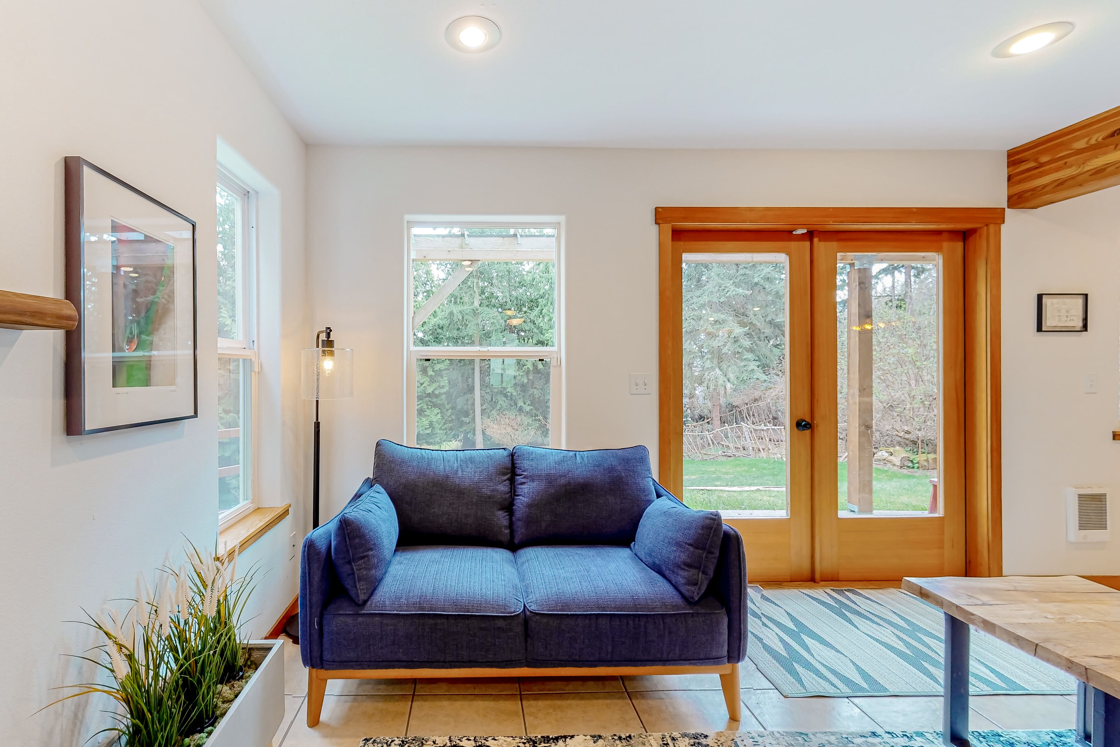 Peaceful, tree-lined home near Clinton with large yard, fireplace & Peloton