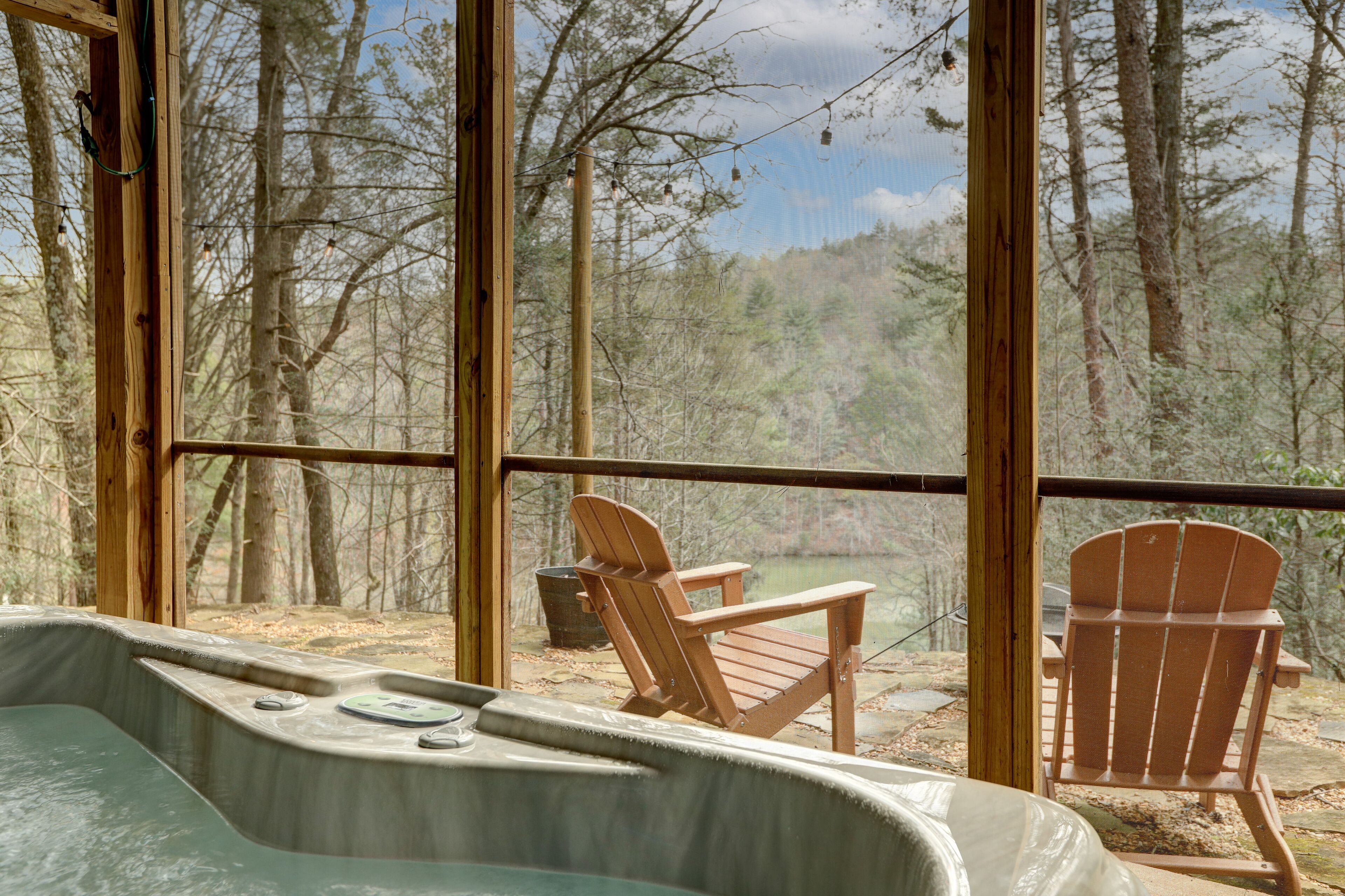 Waterfront home on Sisson Lake with hot tub, firepit, great deck, & game room