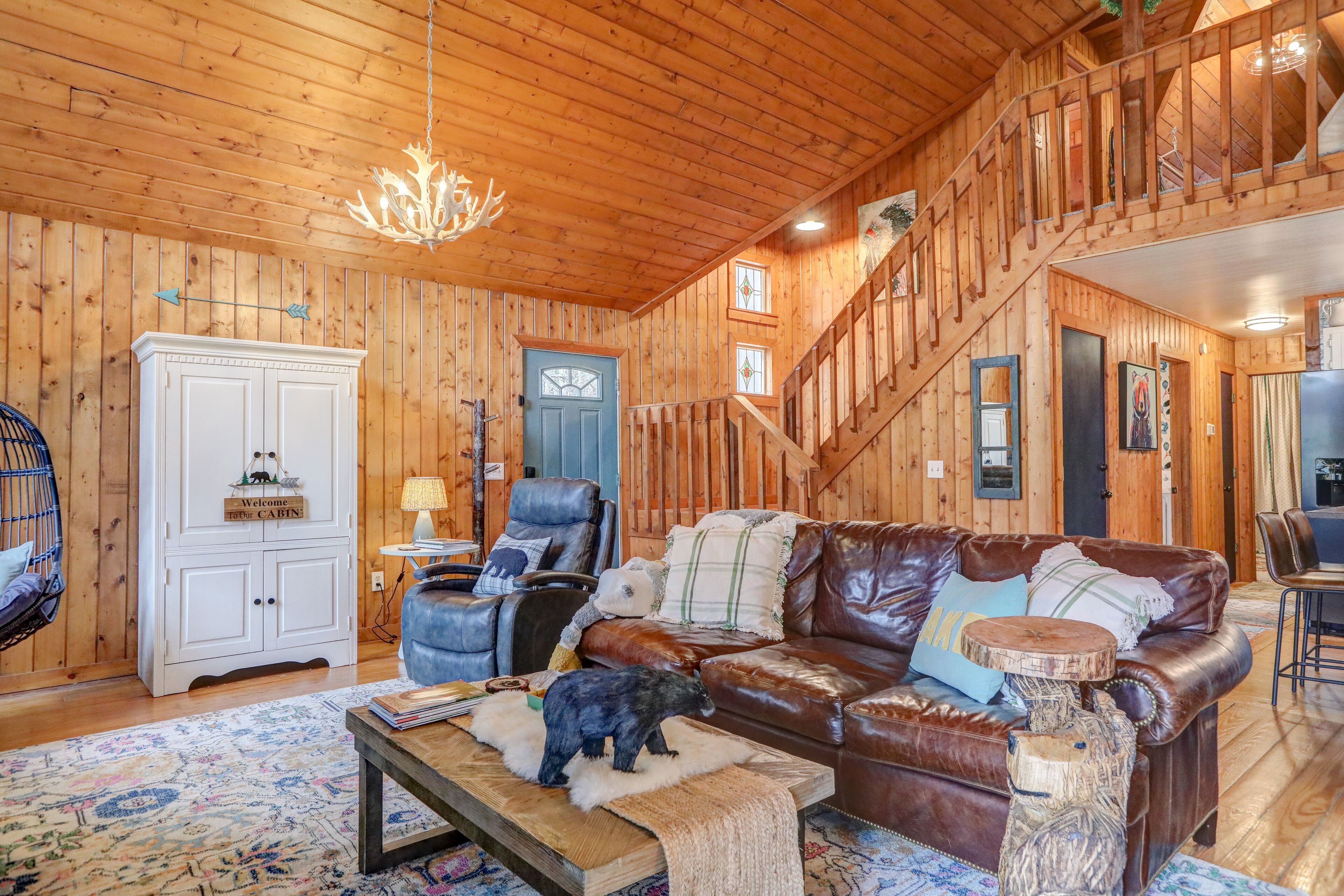 Waterfront home on Sisson Lake with hot tub, firepit, great deck, & game room