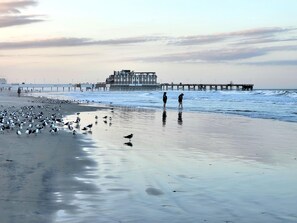 On the beach, sun loungers, beach towels