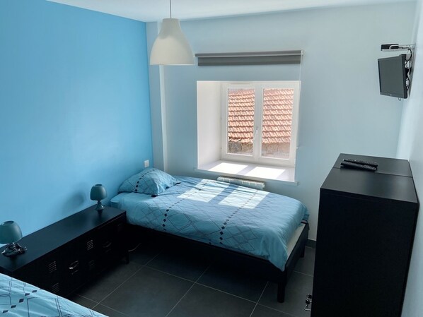 2 dormitorios, tabla de planchar con plancha, wifi gratis y ropa de cama