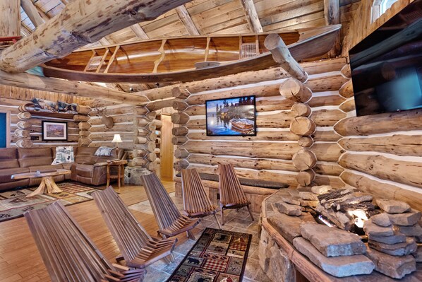 Télévision, cheminée, chaîne hi-fi