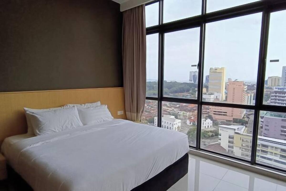 1 bedroom, desk, laptop workspace, bed sheets