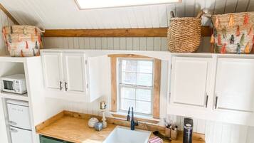 Fridge, microwave, coffee/tea maker, toaster