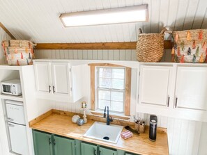 Fridge, microwave, coffee/tea maker, toaster