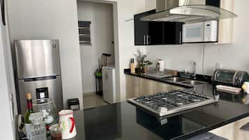 Fridge, microwave, oven, coffee/tea maker