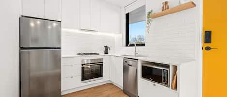 Apartment | Private kitchen | Full-size fridge, microwave, oven, stovetop