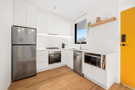 Apartment | Private kitchen | Full-size fridge, microwave, oven, stovetop