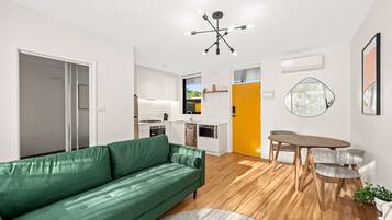Apartment | Living area | 55-inch Smart TV with digital channels, TV, Netflix