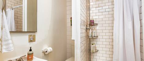 Shower, hair dryer, towels, soap
