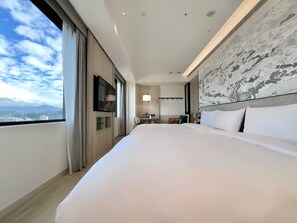 Family Quadruple Room | Premium bedding, down comforters, minibar, blackout drapes