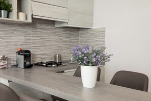 Fridge, microwave, stovetop, coffee/tea maker - Studio "Glicine" with Balcony and Air Conditioning (Trappitello)