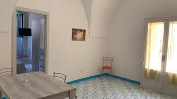 Apartamento, 1 quarto, vista para o jardim | Sala de jantar