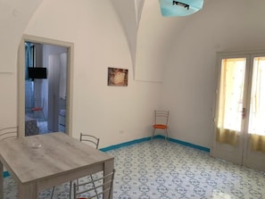 Apartment, 1 Bedroom, Garden View | Dining room - Palazzo De Donno Apartment 4 (Santa Cesarea Terme)