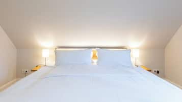 2 dormitorios, tabla de planchar con plancha, cuna de viaje