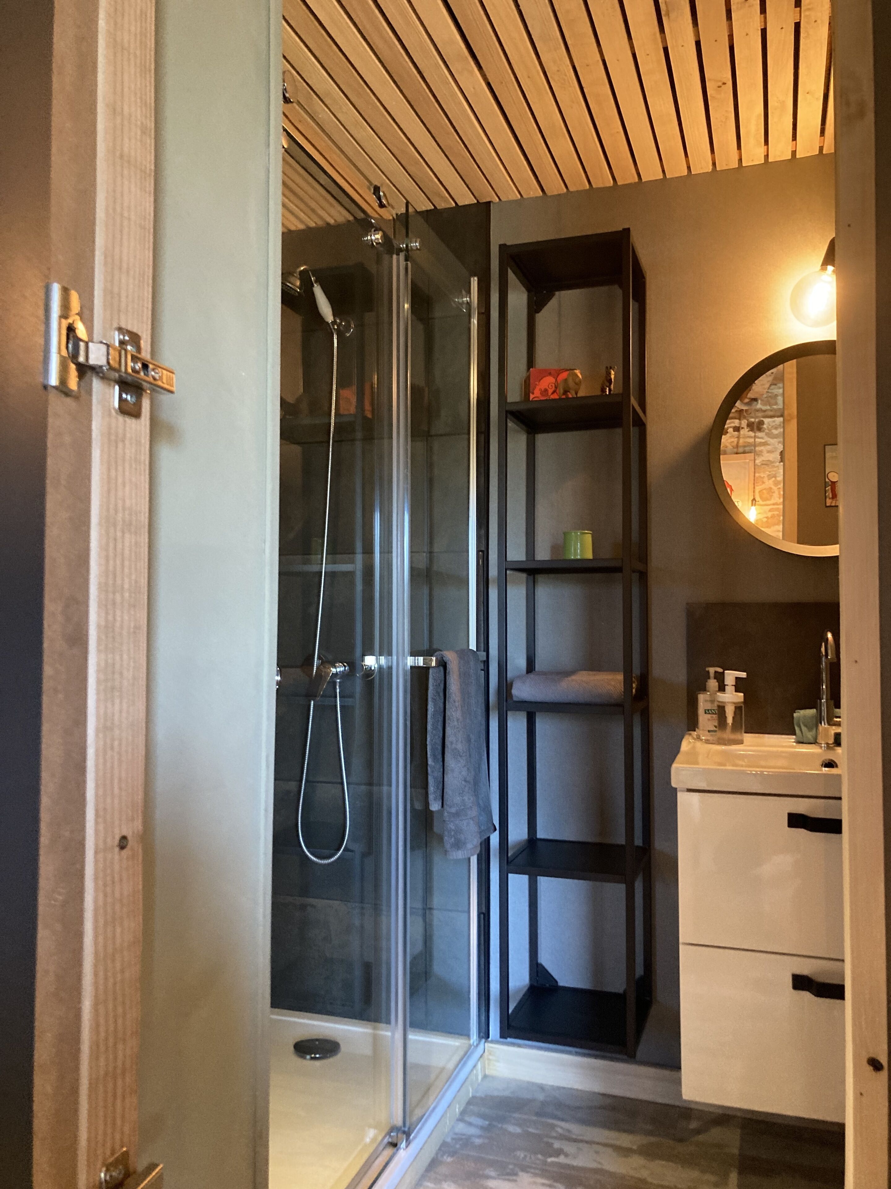 Shower, hair dryer, towels, toilet paper