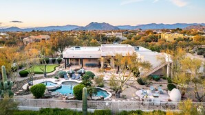 A residential area with a pool, patio, and mountain views. - Private Desert Sanctuary with Pool, Spa, & Putting Green (Cave Creek)