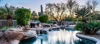 Barwick is a private oasis! Practice on the putting green, shoot pool, and enjoy this city getaway.