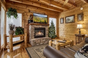 Flat-screen TV, fireplace, foosball