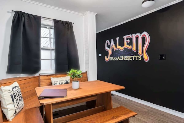 Step into this spooky-chic retreat where autumn leaves meet Salem magic. My home is filled with vibrant local artwork and cozy touches that celebrate the spirit of the season — creating a warm, welcoming space for your fall getaway.