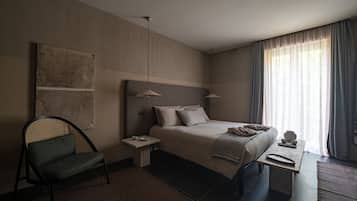 Junior Suite | 1 bedroom, premium bedding, down comforters, minibar