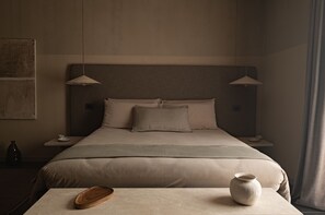 Kamar Deluks | Seprai premium, selimut bulu angsa, minibar, dan brankas